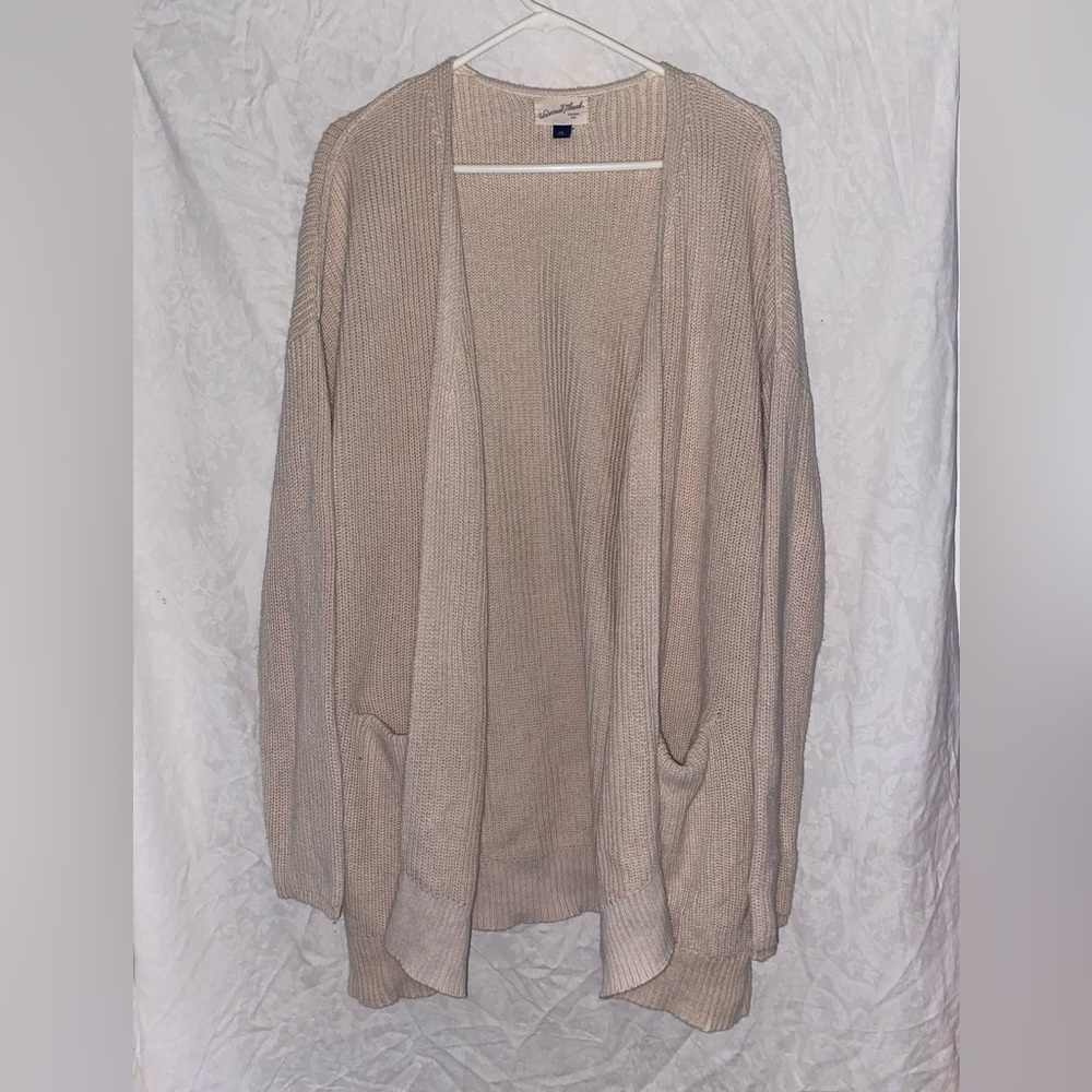 Women’s cream cardigan with pockets